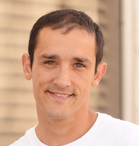 Headshot of owner, Neil Godfrey, smiling.