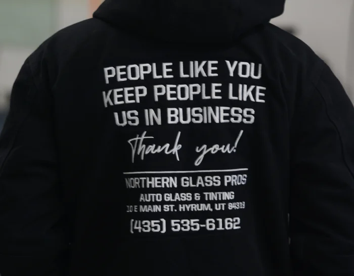 Northern Glass Pros work hoodie that says "People like you keep people like us in business. Thank you!"
