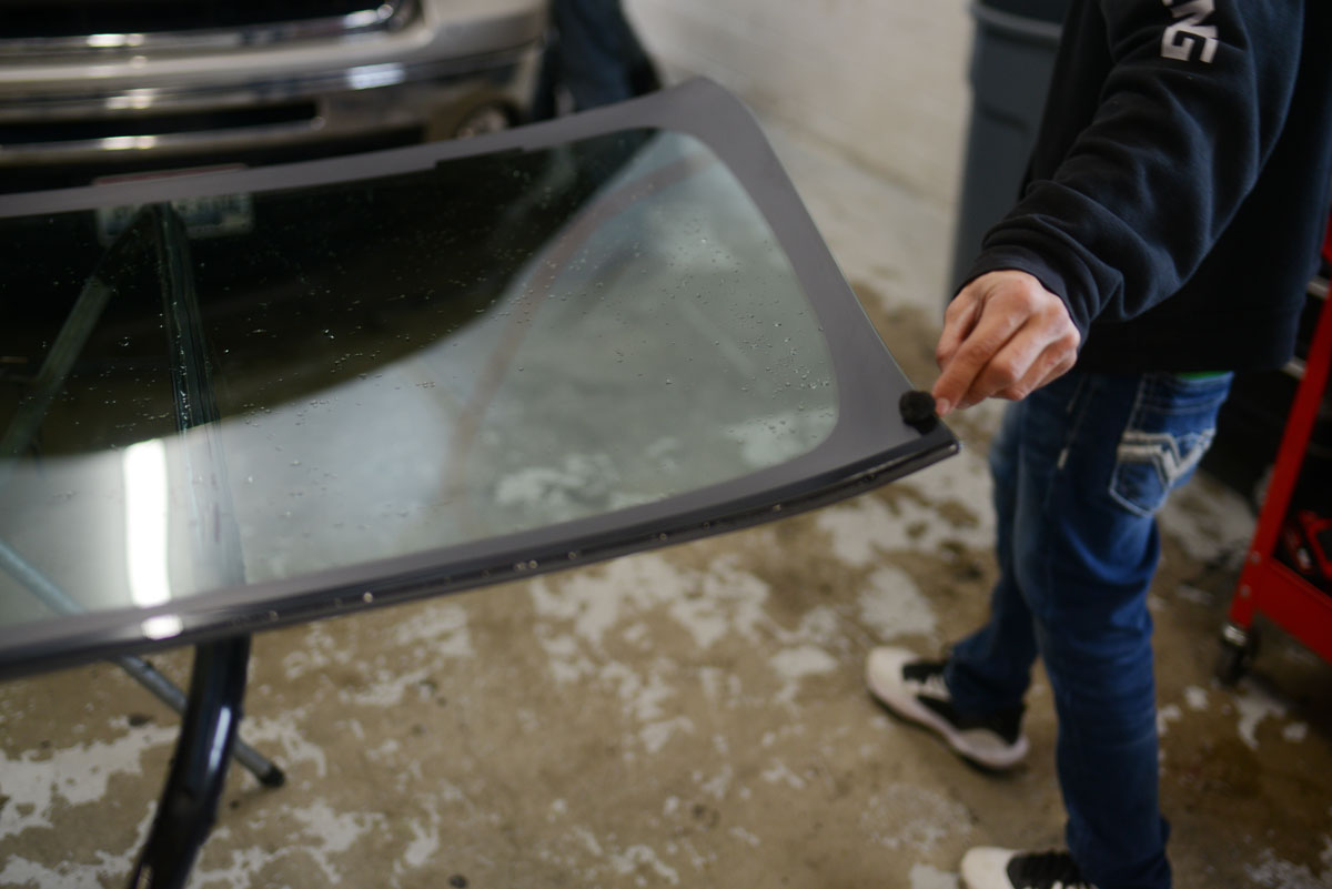 Brand new windshield prepped for installation.