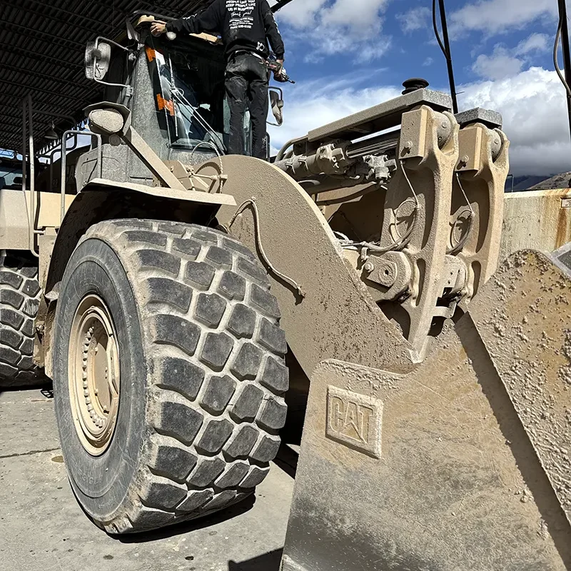 Technician replace a window on a Front Loader.